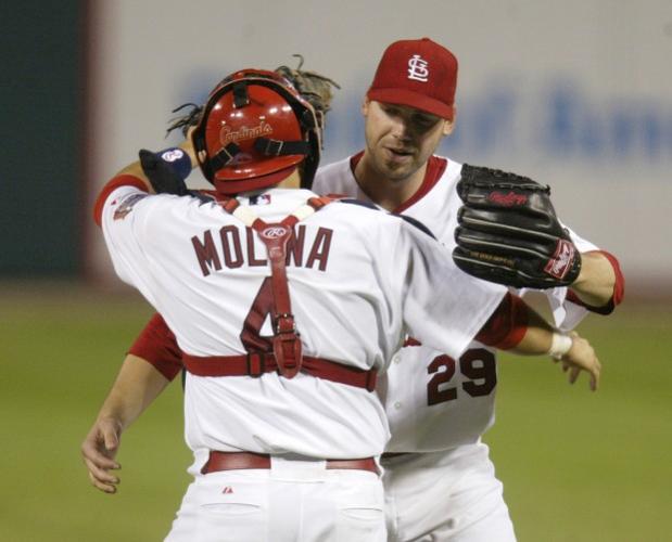 Cards' Molina catches his first bullpen session in camp