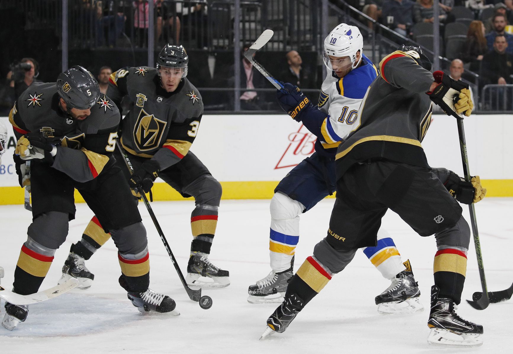 Blues put on a show in Vegas but fall in OT