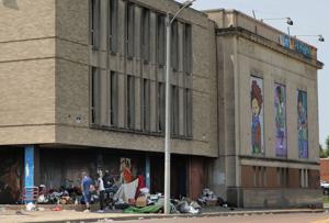 City steps in to save historic bank building, problem property from demolition