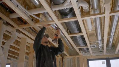 Former firefighter builds home with new fire sprinkler system