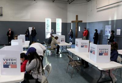 Voters wait at Have Bible Will Travel church