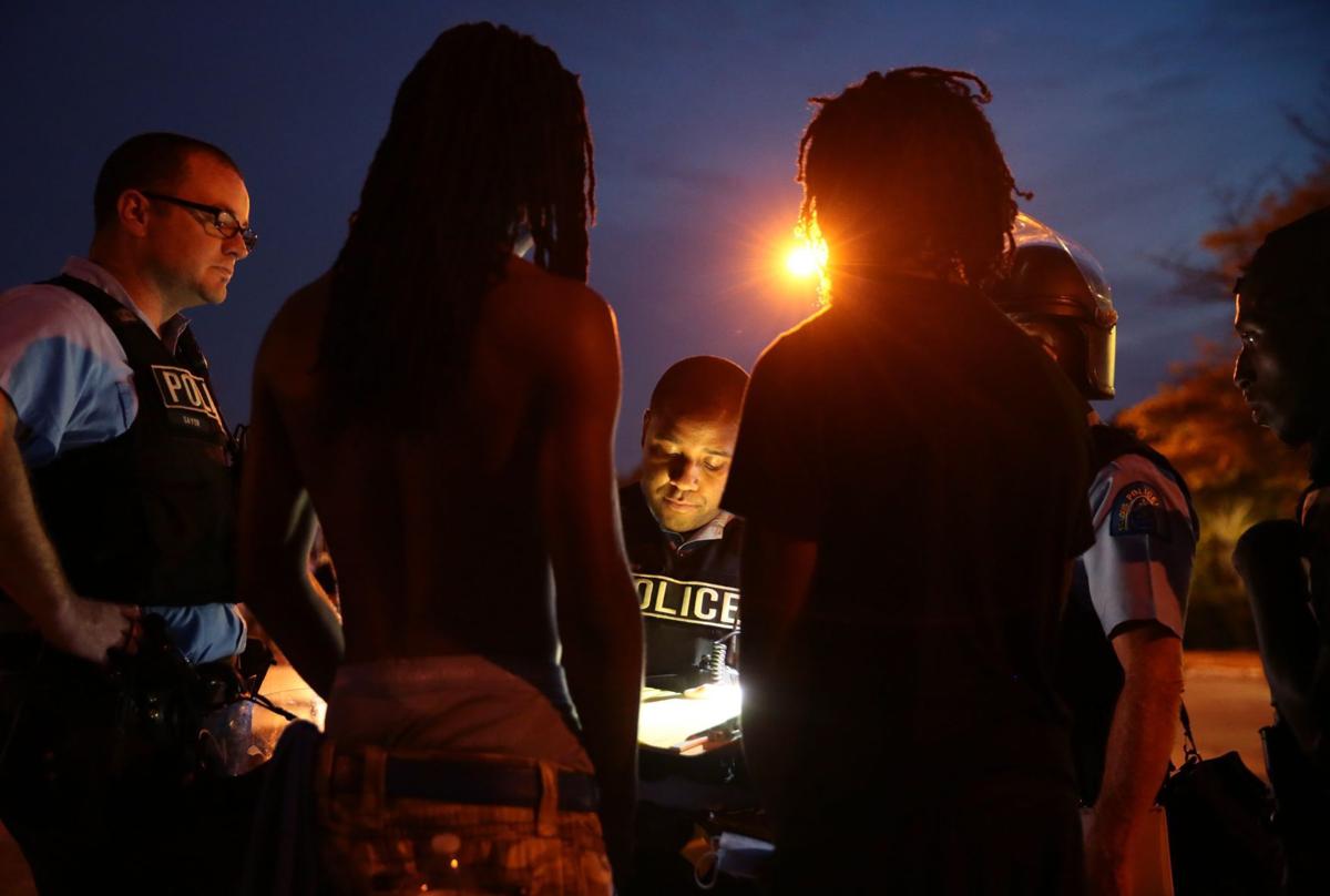 Protesters spend day at police headquarters