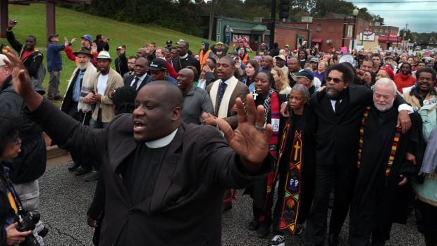 Clergy demonstrates at Ferguson Police Department