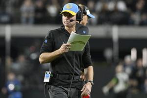 Chargers fire Staley, GM Telesco after blowout