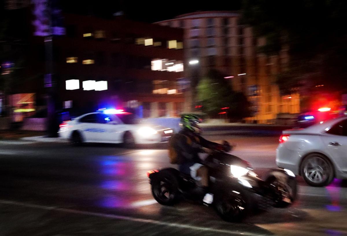 Police try to stop street racing and mayhem downtown