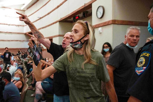 Mask mandate draws angry crowd to Vegas-area schools meeting