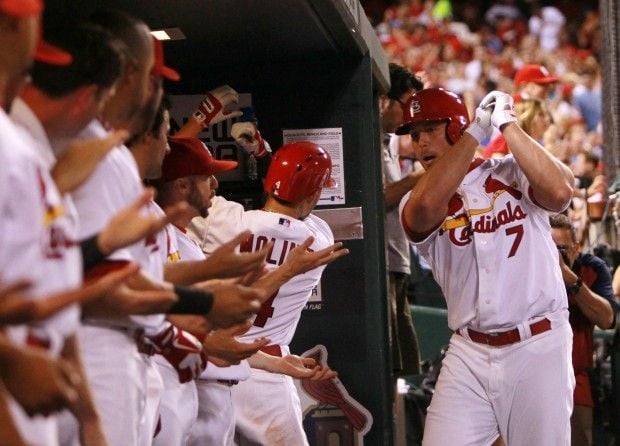 Matt Holliday's slam caps Cardinals' 10th-inning win