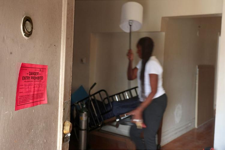 Tornado leaves residents reluctant to separate from damaged property