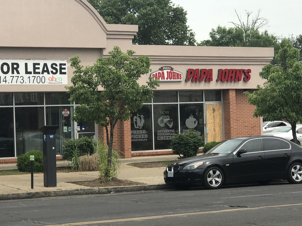 papa johns broken window