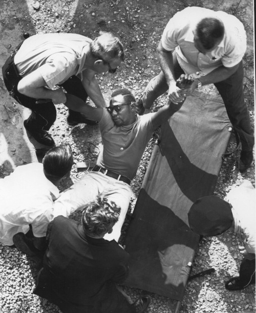 A Look Back • Civil rights protesters climb unfinished Gateway Arch in ...