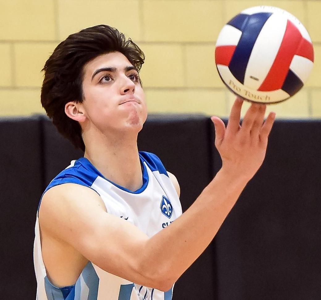 All Metro Boys Volleyball Player Of The Year Ennis Overcomes