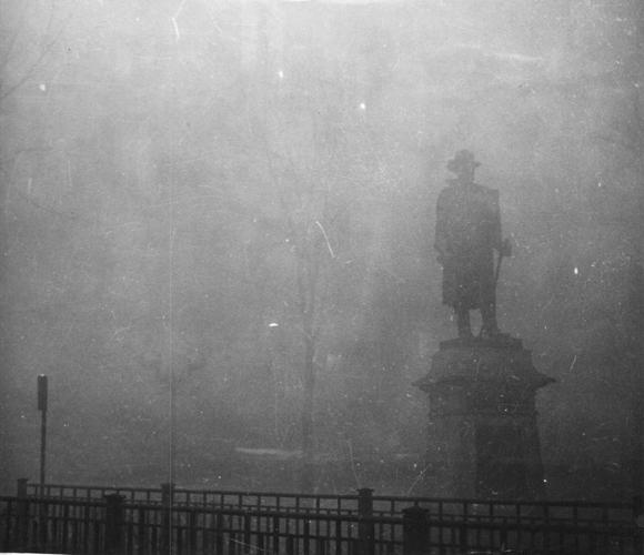 Black Tuesday smoke obscures statue