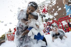 Community holds vigil for Overland couple slain after deportation