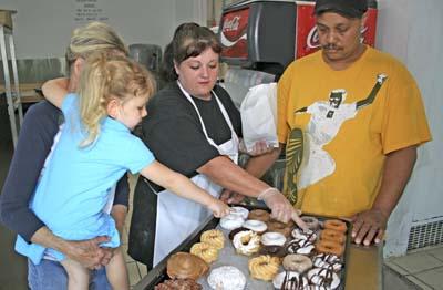 Something to chew on: Police move into doughnut shop's building. 