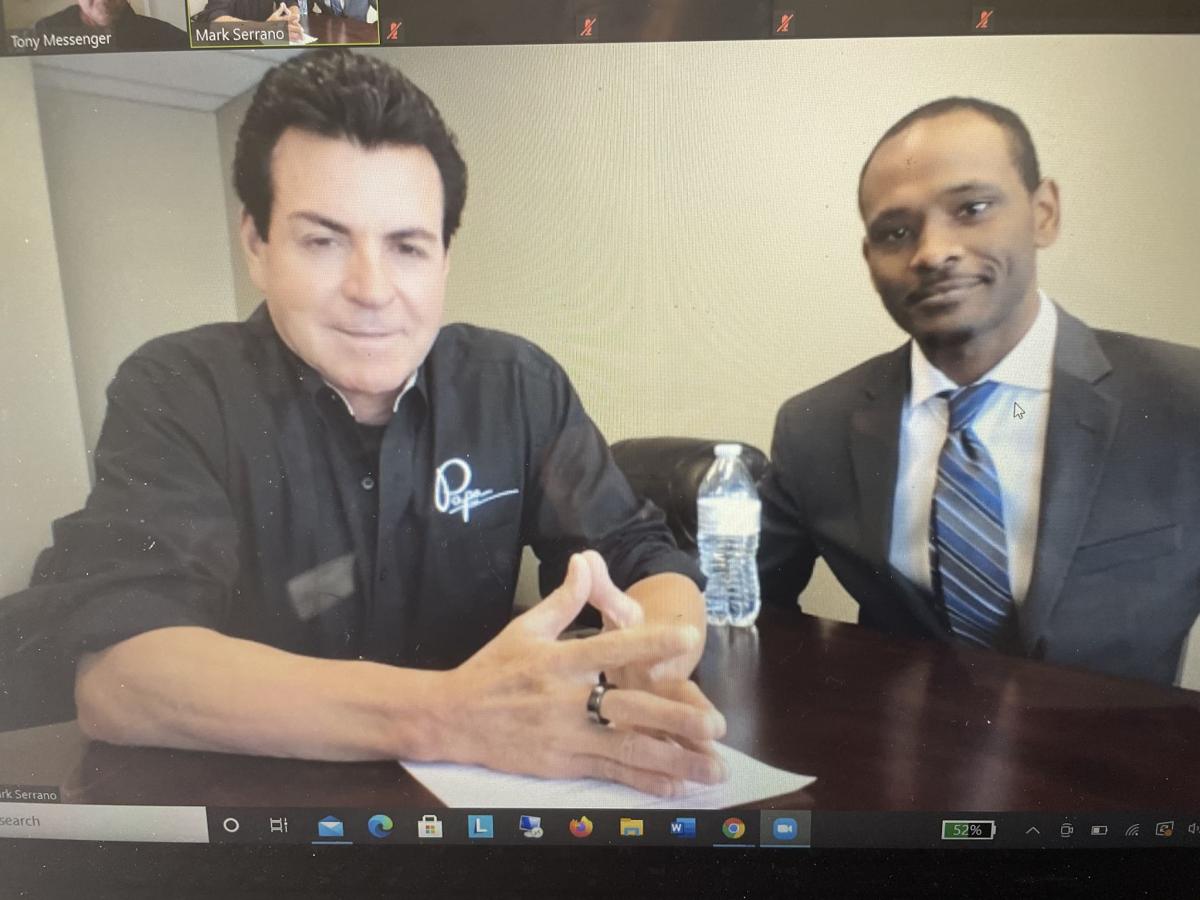 John Schnatter and George Mitchell