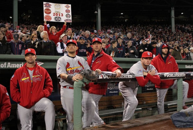 St. Louis Cardinals Jon Jay (L) and Carlos Beltran celebrate in