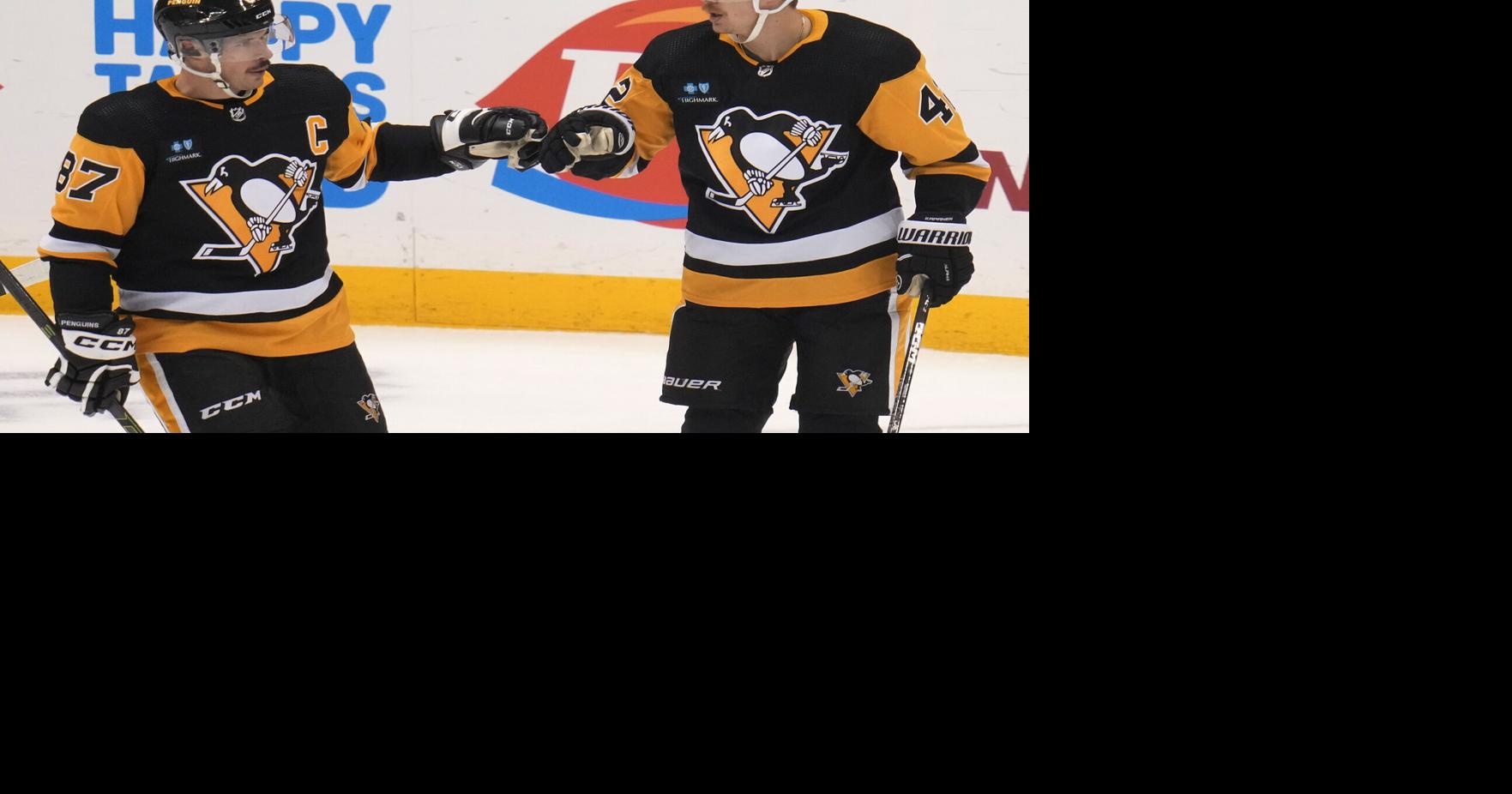 Kasperi Kapanen of the Pittsburgh Penguins celebrates his hat