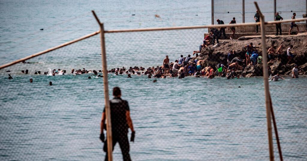 Spain and Morocco halt Ceuta border rush after 57 die