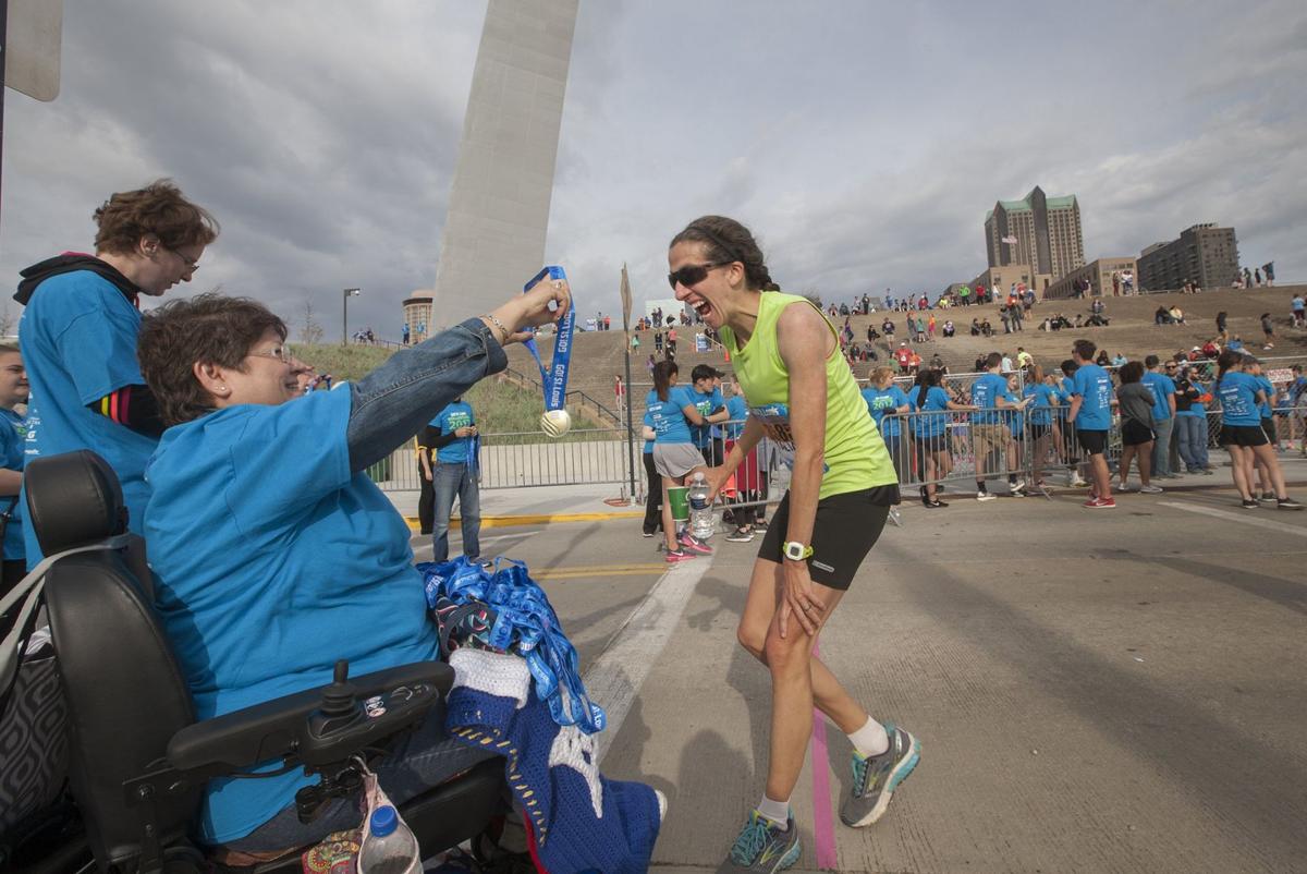 The Go St. Louis Marathon runners race through city streets | Health | 0