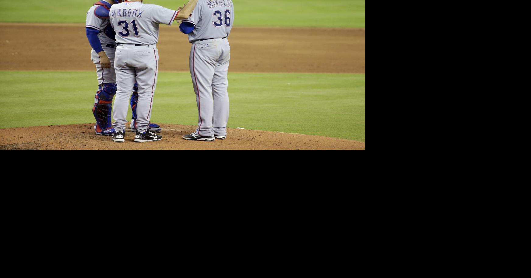 Watch Rangers pitcher Miles Mikolas eat a live lizard