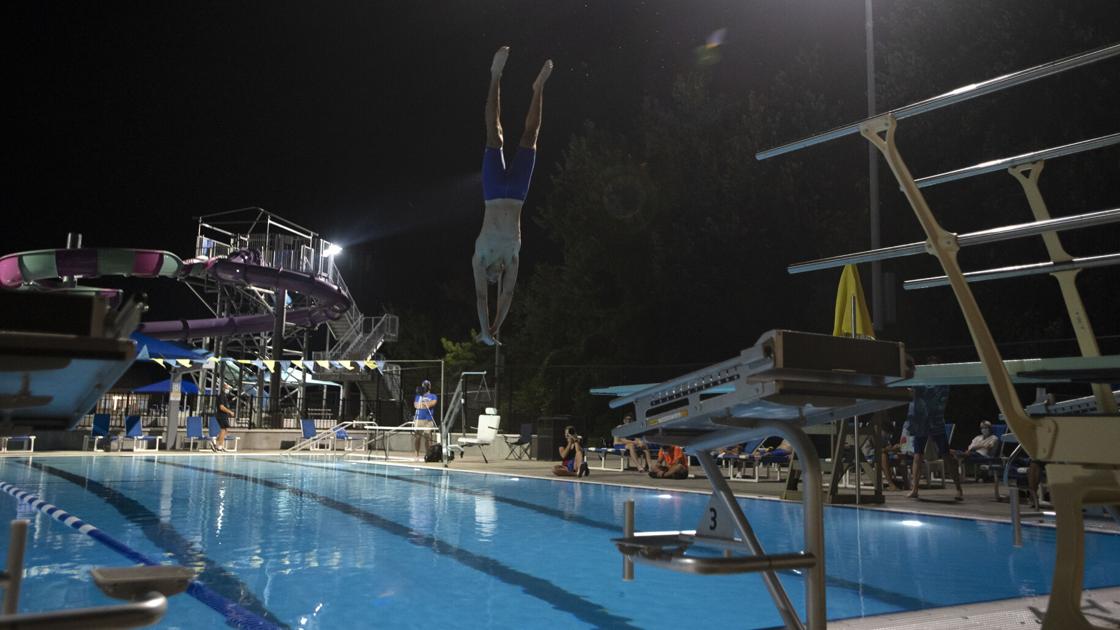 Something different: High school swim meet goes outdoors and under the lights