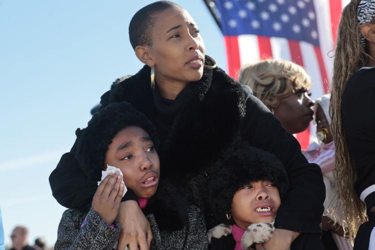 Family, friends, colleagues send-off Ferguson police officer Travis Brown