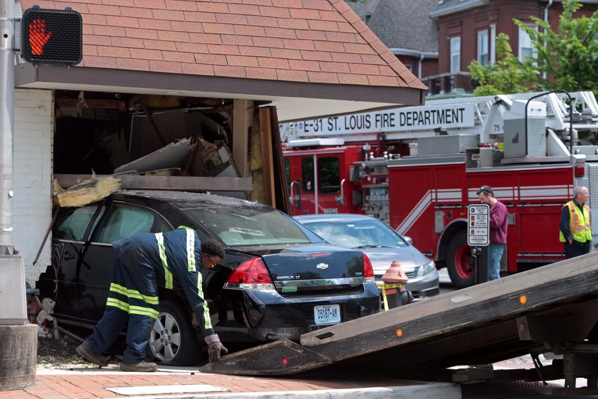 Car crashes into fire truck and building in St. Louis Law and order