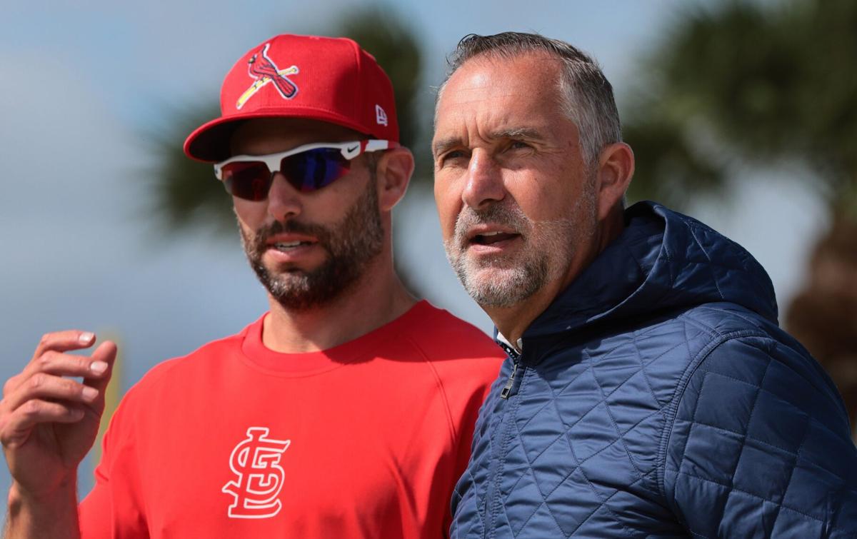 Full squad reports, first team meeting held at Cardinals spring training