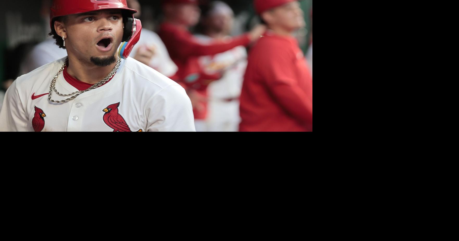 Cardinals' Winn playing through meniscus tear