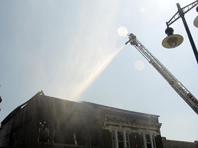 Fire destroys downtown building