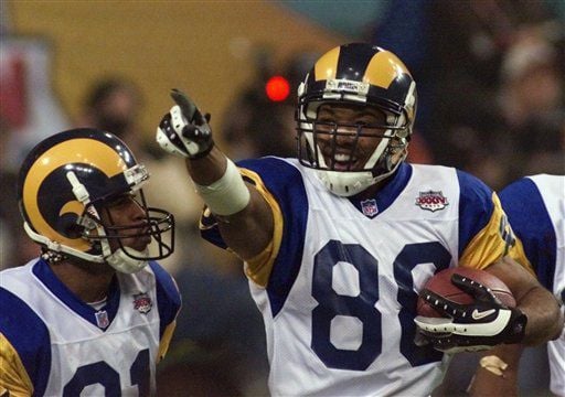 January 30, 2000: St. Louis Rams quarterback Kurt Warner #13 drops back to  pass against the Tennessee Titans in Super Bowl XXXIV (34). The Rams  defeated the Titans by the final score