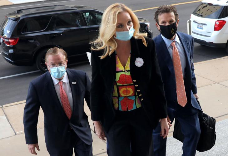 Mark and Patricia McCloskey arrive for arraignment hearing