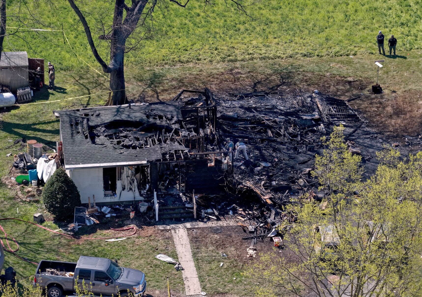 Three people found dead inside house that caught fire, exploded in ...