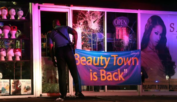 Business vandalized for third time, briefly looted, in Ferguson