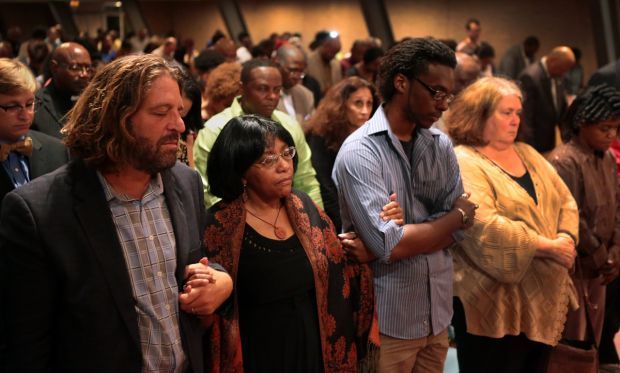 Residents, clergy gather at church forum looking for answers in shooting of Michael Brown