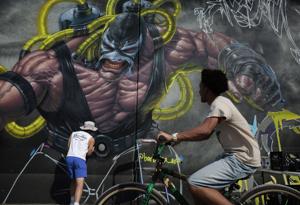 Paint Louis puts new art on an old downtown St. Louis wall, for another year