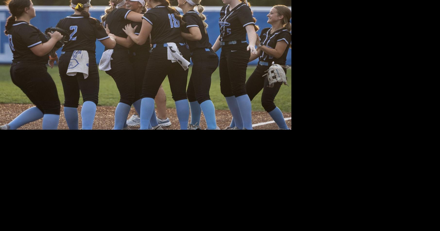 Washington softball talks with the media after its 8-4 victory over Borgia
