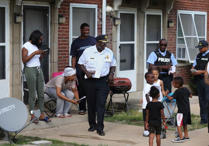St. Louis police chief John Hayden walks Clinton-Peabody housing complex
