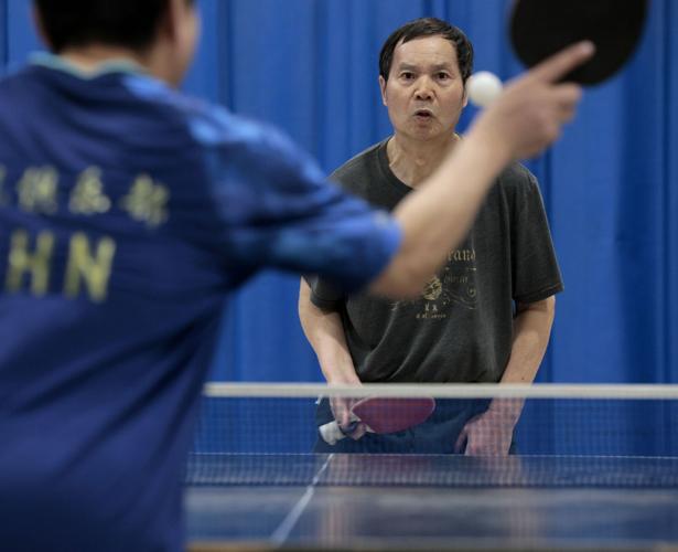 Table tennis enthusiasts meet and play hard