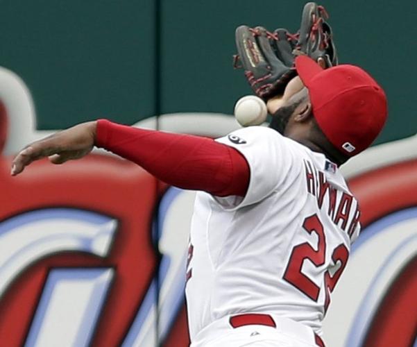 Heyward's double sends Cards past Nationals