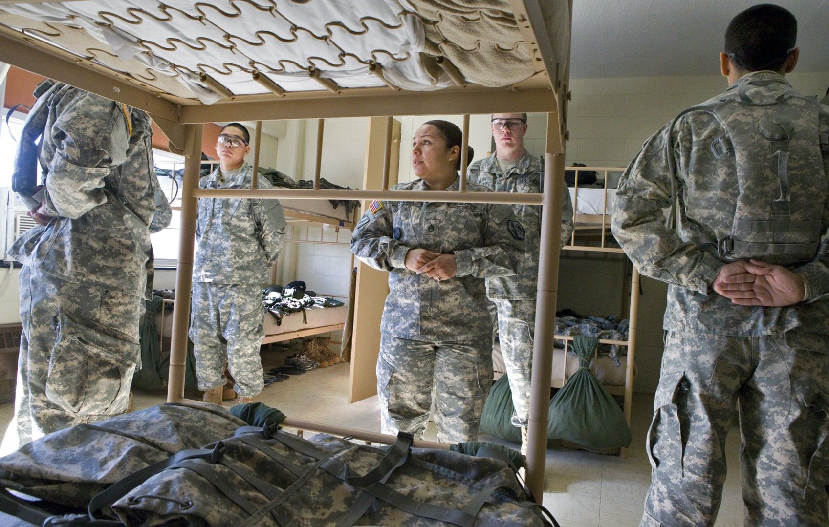 A drill sergeant inspects the barracks image