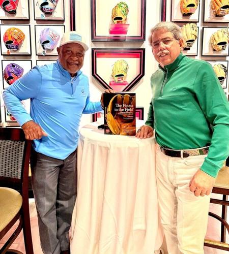 Hall of Famer Ozzie Smith with author Ed Wheatley and his new book, 'The Finest in the Field'