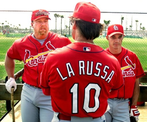 St. Louis Cardinals manager Mike Matheny and Mark McGwire watch