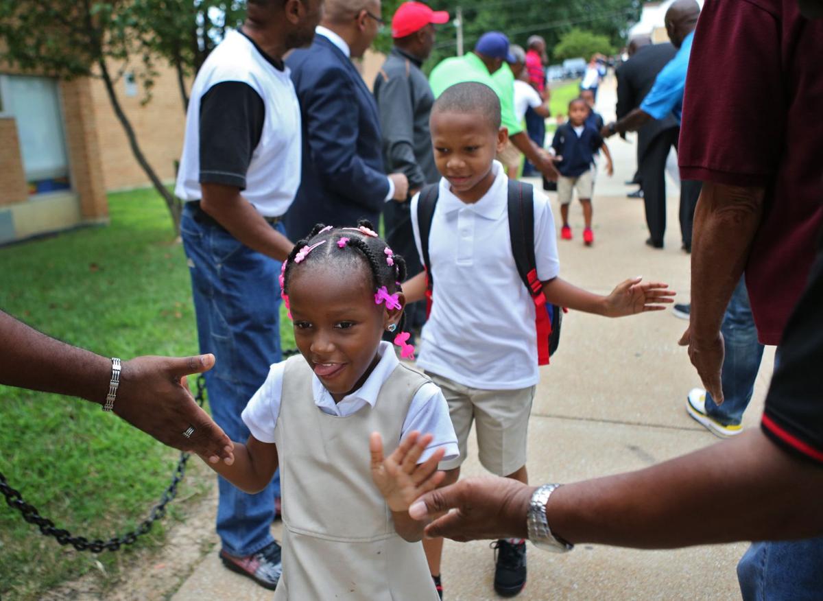 School starts in Jennings, and students get warm Education