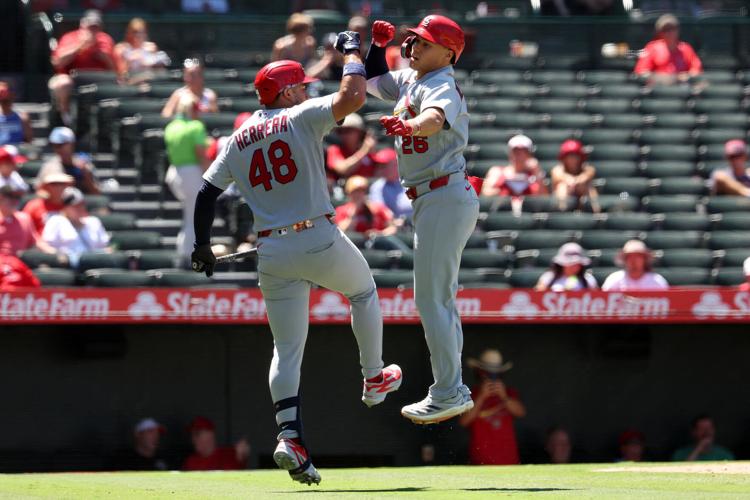 Jul 22, 2026; Anaheim, California, USA; �����Ӱ�ԭ�� Cardinals second baseman JJ Wetherholt (26) celebrates with designated hitter Ivan Herrera (48) after hitting a solo home run during the sixth inning against the Los Angeles Angels at Angel Stadium. Mandatory Credit: Kiyoshi Mio-Imagn Images