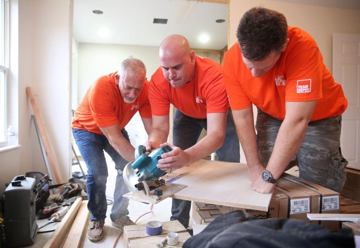 Volunteers help modify paralyzed veteran Chris Sanna's home in House Springs | Home & Garden ...