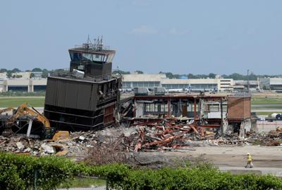 Airport officials say slight delay in overhaul to trim costs