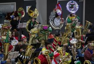 Oh, come all ye faithful tuba players: Musicians come together for holiday tunes