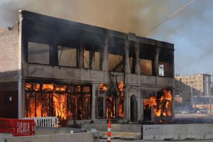 St. Louis firefighters fight building fire on North Grand Boulevard and Herbert Street