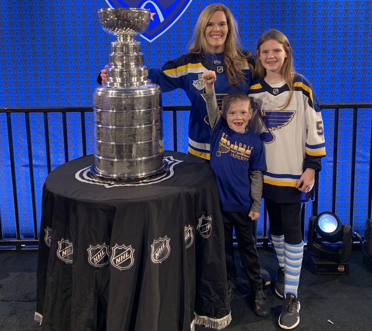 My dad drinking out of the Stanley cup with the Blues coach : r/hockey